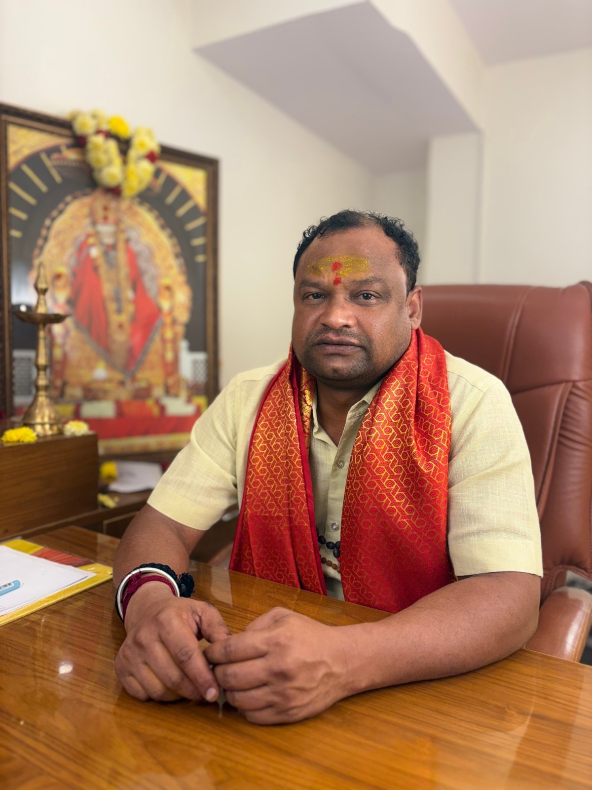 Astrologer seated in the consultation room